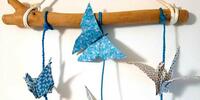 Atelier de création d’un mobile en origami et bois flotté